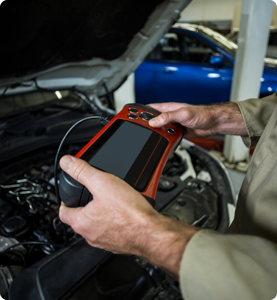 mechanic hand with tester