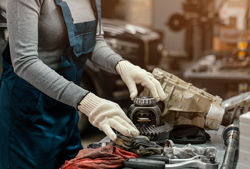 sideways-woman-working-car-service